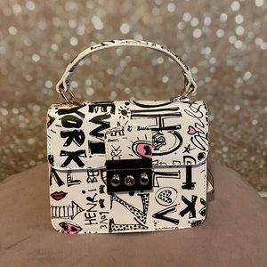 White graffiti clutch